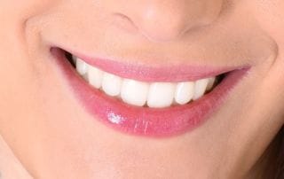 closeup of smile with white healthy teeth 2024 10 22 21 30 26 utc (1) min
